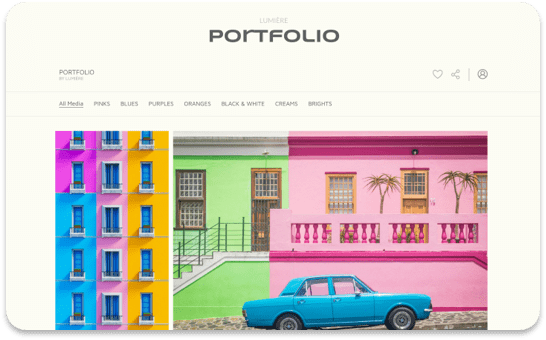 Website portfolio showcasing vibrant photos of colorful buildings and a blue vintage car